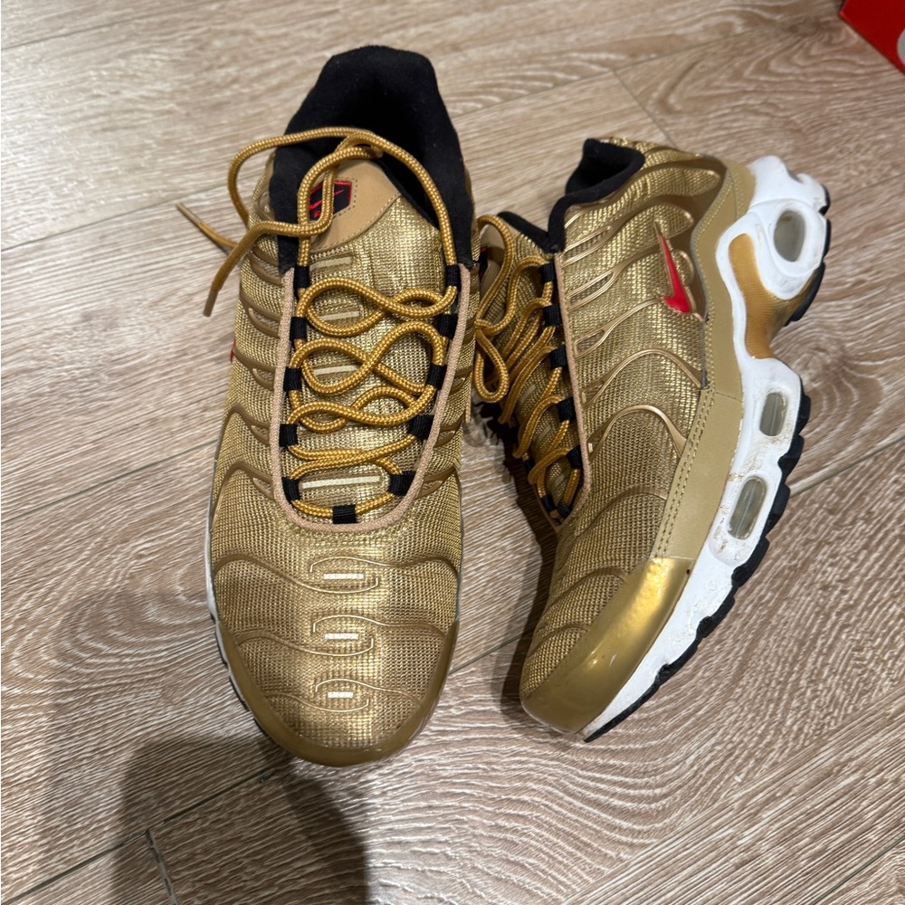 Nike Metallic Gold Sneakers with Red Swoosh